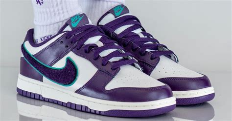 nike purple swoosh dunks